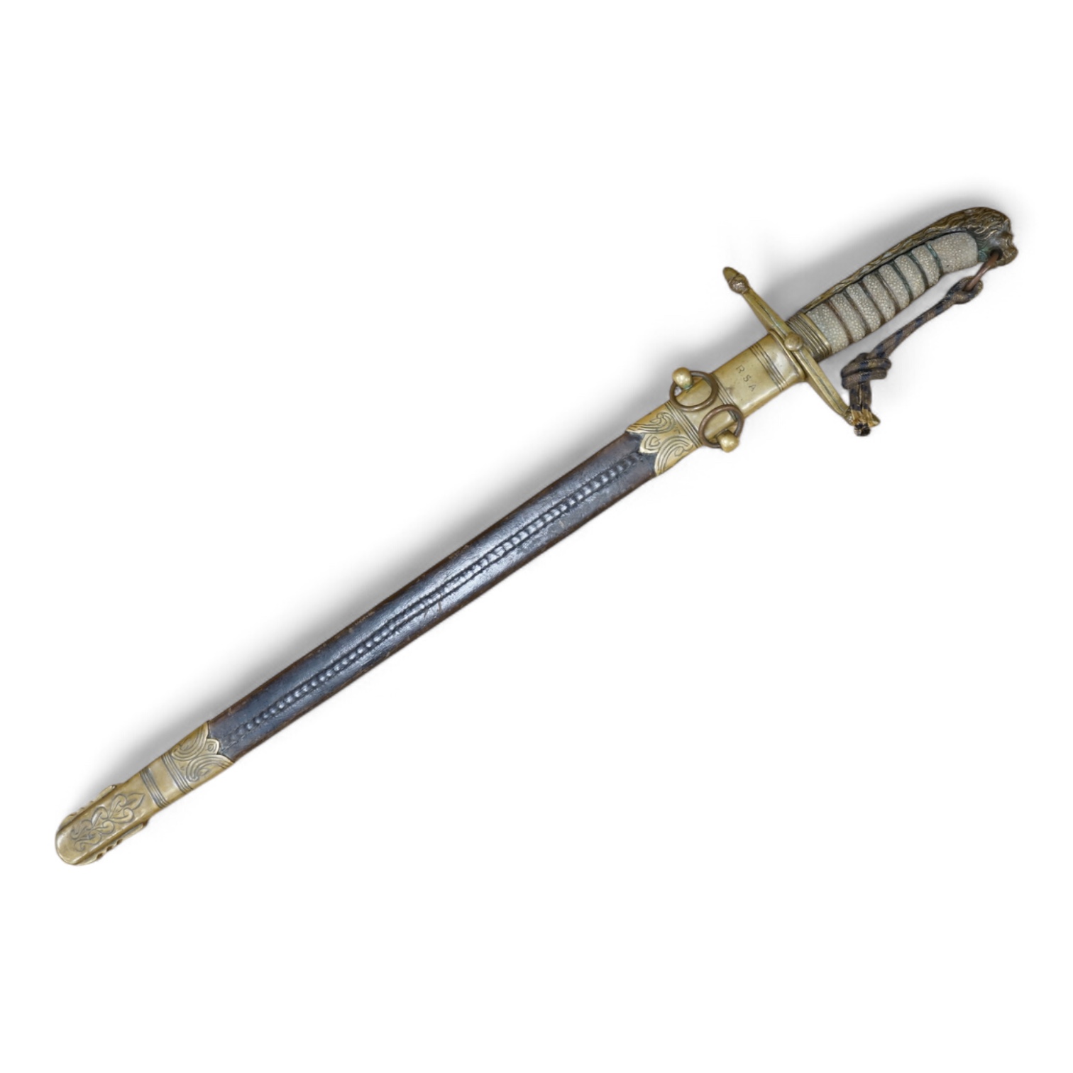 A post 1902 Naval Officer’s Dirk, the regulation blade with crowned fouled anchor, regulation hilt with remains of bullion dress knot in its leather scabbard with brass mounts, locket engraved with owners initials; RSA